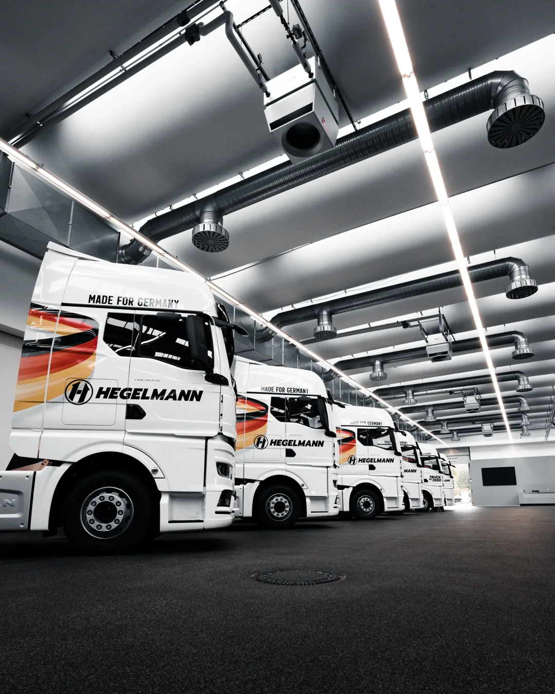 Fahrzeugbeschriftung – Lkw Flotte – Referenzfoto von Die Werbetechniker Karlsruhe